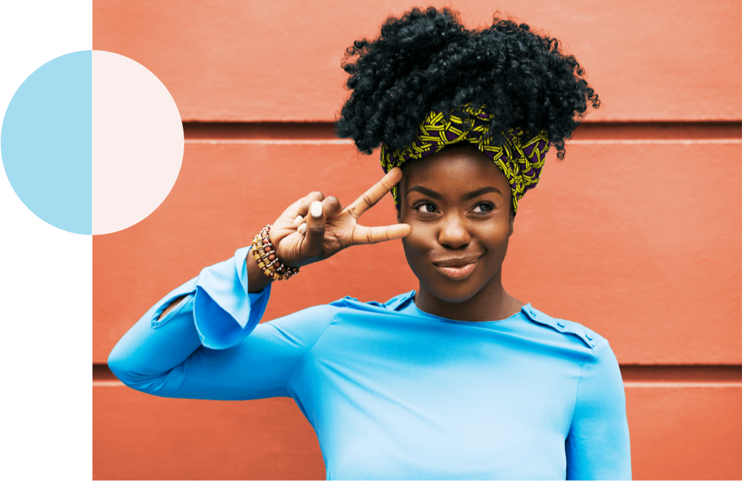 Woman making peace sign with her hand